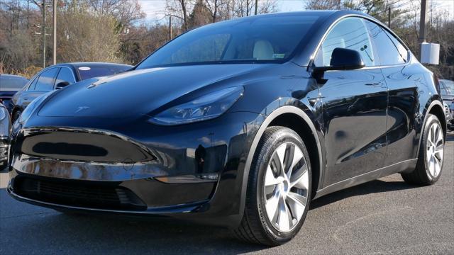 Used cars for sale 2023 Tesla Model Y Long Range Dual Motor All-Wheel Drive, price is 32999, vin 7SAYGDEE6PF800830 in Alexandria, VA, dealer name is Select Auto Imports Best Dream car image